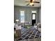 Comfortable living room with modern furniture, a patterned rug, and neutral color scheme at 179 E Pearl St, Greenwood, IN 46143