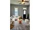 Cozy living room setup with a white sectional sofa, a stylish rug, and contemporary decor at 179 E Pearl St, Greenwood, IN 46143