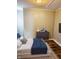 Cozy main bedroom with soft bedding and a modern dresser at 179 E Pearl St, Greenwood, IN 46143