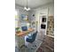 Bright office with a desk, chair, and lots of storage, plus an adjacent room with dark cabinets at 179 E Pearl St, Greenwood, IN 46143