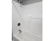 Clean shower-tub combination featuring sleek, bright design and updated fixtures at 179 E Pearl St, Greenwood, IN 46143