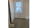Bedroom featuring plush carpeting and a bright window at 1820 S M St, Elwood, IN 46036