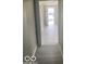 Hallway with new plank flooring and neutral wall color at 1820 S M St, Elwood, IN 46036