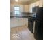 Bright kitchen features white cabinets, modern appliances, and sleek countertops at 1820 S M St, Elwood, IN 46036