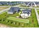 Aerial view of house, pool, gazebo, and bocce ball area in the Lindley Run community at 19144 Goins Blvd, Westfield, IN 46074