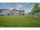 Expansive backyard featuring lush green grass and well-maintained landscaping at 19144 Goins Blvd, Westfield, IN 46074