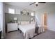 Calm bedroom with stylish wall decor, soft lighting, and plush carpeting that enhances the cozy atmosphere at 19144 Goins Blvd, Westfield, IN 46074