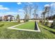 Community area with a bocce ball court, gazebo, and manicured landscaping at 19144 Goins Blvd, Westfield, IN 46074