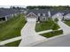 Charming home boasts a manicured lawn, inviting front porch, and a two-car garage at 19144 Goins Blvd, Westfield, IN 46074