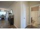 Hallway leading to a bathroom and dining room with decor at 19144 Goins Blvd, Westfield, IN 46074