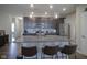 Well-equipped kitchen with granite countertops, stainless steel appliances, and a center island with seating at 19144 Goins Blvd, Westfield, IN 46074