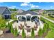 Community outdoor gathering area with a fire pit, grill, and gazebo at 19144 Goins Blvd, Westfield, IN 46074