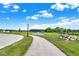 Community walking path with picturesque fountain in the background, ideal for walking, jogging, or enjoying nature at 19144 Goins Blvd, Westfield, IN 46074