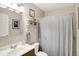 Clean and bright bathroom with neutral walls and vanity, plus shower and tub at 200 Forum Dr, Whiteland, IN 46184