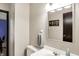 Clean bathroom featuring a vanity, framed mirror, toilet, and towel rack at 200 Forum Dr, Whiteland, IN 46184