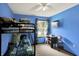 Bedroom features carpet floors, blue walls, window, desk and bunk beds at 200 Forum Dr, Whiteland, IN 46184