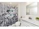 Clean bathroom with a white vanity and a decorative floral shower curtain with light at 200 Mission Terrace Dr, Whiteland, IN 46184