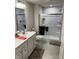 A pristine bathroom featuring a double sink vanity and a glass-enclosed shower, offering modern comfort at 200 Mission Terrace Dr, Whiteland, IN 46184