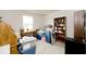 Bedroom features a mix of furniture and storage items with plenty of natural light at 200 Mission Terrace Dr, Whiteland, IN 46184