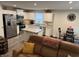 Inviting kitchen with granite countertops, stainless steel appliances, and white cabinetry in an open layout at 200 Mission Terrace Dr, Whiteland, IN 46184