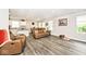 Open-concept living space with a view of the kitchen, dining area, and comfortable seating at 200 Mission Terrace Dr, Whiteland, IN 46184