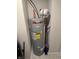 Energy-efficient water heater installation with expansion tank and safety features in utility space at 200 Mission Terrace Dr, Whiteland, IN 46184