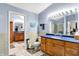 Double bathroom features a wooden cabinet sink and tiled flooring at 201 Angela Ct, Noblesville, IN 46062