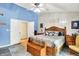 Comfortable bedroom with ample natural light, a ceiling fan, and wood accents at 201 Angela Ct, Noblesville, IN 46062