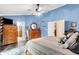 Inviting bedroom featuring wood furniture, a ceiling fan, and hardwood floors at 201 Angela Ct, Noblesville, IN 46062