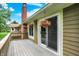 Outdoor deck area with hanging flower baskets at 201 Angela Ct, Noblesville, IN 46062
