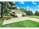Spacious driveway leading to a home with mature trees and landscaping, and a basketball hoop at 201 Angela Ct, Noblesville, IN 46062