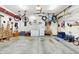 Spacious garage with ample storage and overhead bicycle racks at 201 Angela Ct, Noblesville, IN 46062
