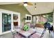 Covered patio with dining area and barbecue grill at 201 Angela Ct, Noblesville, IN 46062