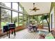 Spacious screened-in porch perfect for outdoor dining and relaxation at 201 Angela Ct, Noblesville, IN 46062