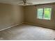 Spacious bedroom with ceiling fan and a bright window view at 213 Golf Ct, Greenwood, IN 46143