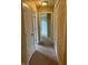 Hallway with multiple doors leading to different rooms at 213 Golf Ct, Greenwood, IN 46143