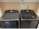 Laundry room featuring new Samsung front load washer and dryer at 213 Golf Ct, Greenwood, IN 46143