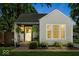 Charming single-story home with a cozy front porch and well-maintained landscaping at 2521 Mcleay Dr, Indianapolis, IN 46220