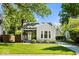 Home exterior with well-manicured lawn, a classic design, and inviting front porch at 2521 Mcleay Dr, Indianapolis, IN 46220