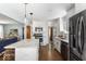 An open concept kitchen flows into the dining area at 2521 Mcleay Dr, Indianapolis, IN 46220