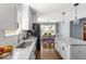 Kitchen view of marble countertops and stainless appliances at 2521 Mcleay Dr, Indianapolis, IN 46220
