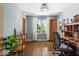 A functional office space with natural light, wood floors, and desk at 2521 Mcleay Dr, Indianapolis, IN 46220