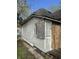 Side view of an older, distressed home with boarded windows and exposed siding at 330 N Lasalle St, Indianapolis, IN 46201