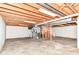 Spacious unfinished basement with concrete floor, exposed ceiling with lighting, and heating unit at 3772 Christina Ct, Carmel, IN 46033
