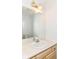 Bathroom featuring a single sink vanity, mirror, and light fixture providing a clean, neutral space at 3772 Christina Ct, Carmel, IN 46033