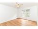 A bedroom featuring wood floors and a window with natural light at 3772 Christina Ct, Carmel, IN 46033