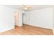 Bedroom featuring wood floors and a walk-in closet at 3772 Christina Ct, Carmel, IN 46033