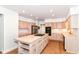 Spacious kitchen features a gas stovetop island, bright lighting, and plenty of cabinet and countertop space at 3772 Christina Ct, Carmel, IN 46033
