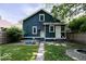 View of a private fenced backyard with manicured lawn, offering a serene escape with plenty of room for relaxation at 3934 N Kenwood Ave, Indianapolis, IN 46208