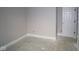 Unfinished basement featuring concrete floors and a white painted door at 4290 Ironclad Dr, Bargersville, IN 46106
